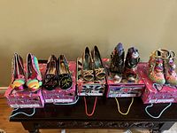 Overview of five pairs of Irregular Choice shoes on boxes
