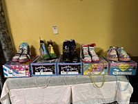 Overview of all five pairs of Irregular Choice shoes on their respective shoeboxes