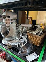 Mixer with glass bowl, stainless bowl, attachments in basket