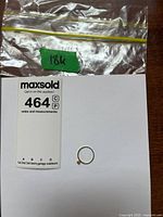 Ring in bag with 18K label and lot tag