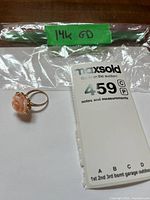 Ring with size tag and 14K GD label