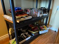 Shelving unit with majority of bakeware items visible