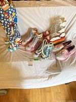 All five pairs of novelty/platform footwear displayed together