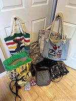 Group view of all eight bags on floor for scope and condition