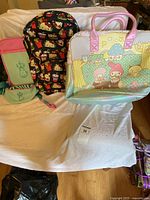 Group shot of all five bags on chair