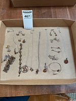 Full tray showing all silver and amber jewellery pieces