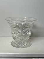 Front and side view of the crystal flower vase highlighting the cut patterns and shape