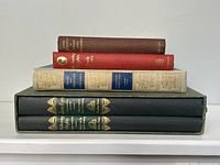 Six vintage hardcover books stacked, including sets of Pride and Prejudice, Wuthering Heights, Jane Eyre, shown front and side views.