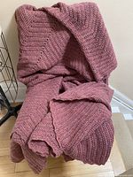 Blanket draped over chair showing overall size and colour