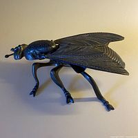 Top view of fly ashtray, wings closed