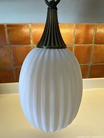 Lamp hanging to show overall form and finish
