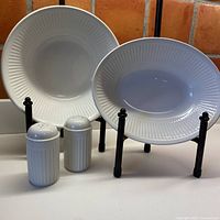 Full set showing both bowls and shakers displaying ribbed design