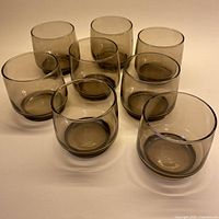 Eight smokey grey lowball glasses grouped