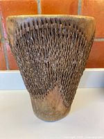 Full view of drum showing conical shape and lacing