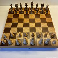 Chess board fully set up with pieces