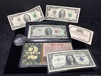 All four bills displayed with folio and certificate in black background.