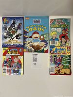 Full lot of six kids comics arranged on a flat surface. Includes titles from Archie, Betty and Veronica, Teen Titans, and Rugrats series.