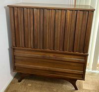 Front view of closed highboy dresser