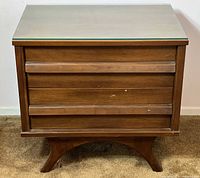 Front view of mahogany nightstand with removable glass top