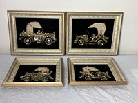 Four vintage classic car multi media artworks arranged in two rows on a white surface showing the frames, size and condition.