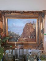 Front view of entire framed print showing canal scene and ornate frame