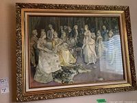 Front view of framed print showing full artwork and ornate frame with window reflection.