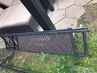 Single metal panel laid on grass showing lattice and hinge