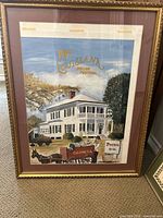 Framed 1997 Louisiana Pecan Festival poster with plantation house and horse cart scene in gold frame