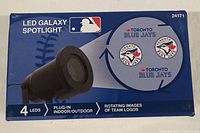 Box front of LED Galaxy Spotlight showing projected rotating Toronto Blue Jays logos and product details.