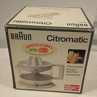 Original Braun Citromatic juicer packaging box with branding in multiple languages and image of the product.