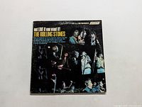 Front cover showing live performance collage for The Rolling Stones album "Got Live If You Want It!"