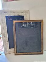 Both framed chalkboards front view