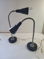 Both Ikea Kvart lamps side by side angled view