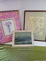 Group shot of all three framed artworks