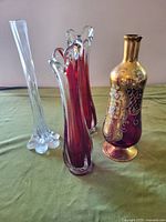 Group of four vases displayed together