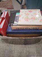 Box showing variety of unused albums