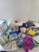 Group view of all boxed and loose baby items