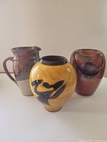 Front view of the three ceramic pieces