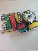 Bag showing assorted coloured rope spools and bundles
