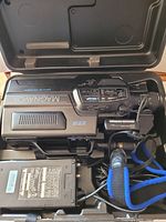Camcorder, power adapter and case interior