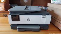 Front view of HP OfficeJet Pro 8025e printer showing general condition and placement of controls.