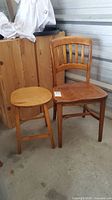 View of vintage solid wood chair and stool showing wood grain and design