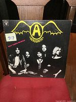 Front cover of Aerosmith Get Your Wings LP showing band photo and logo