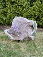 Full front view of the amethyst geode on stand