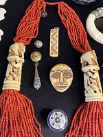 Full overview of jewelry lot on black cloth