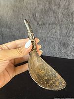 Front-side view showing bowl and handle