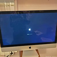 Front view showing power-on boot progress bar on the display