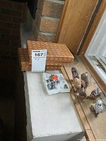 Top view showing collection of six miniature wood birds and two decorative boxes with a small tray holding additional small objects.
