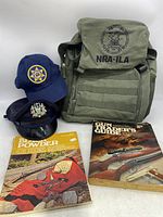 Photo of entire lot showing backpack, hats, and books together