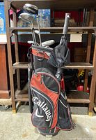 Front and side views of the Callaway golf bag showing the clubs, umbrella, and towel attached